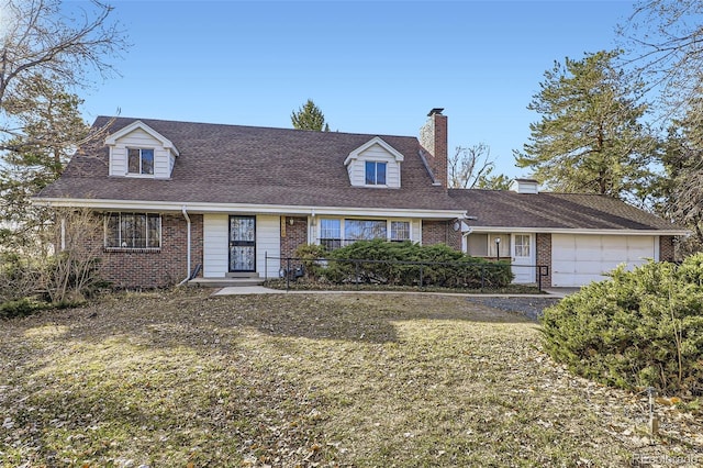 view of front of house with brick siding, an attached garage, a chimney, and roof with shingles