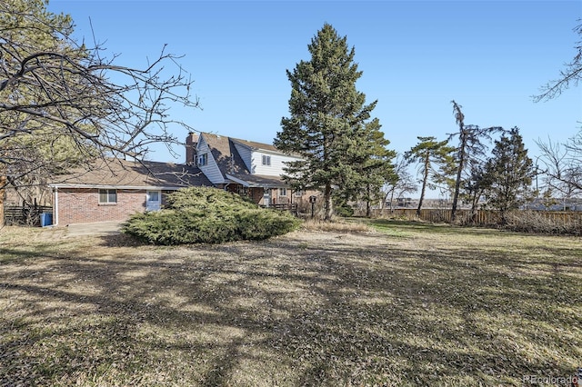 view of yard with fence