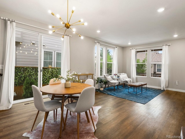 229 W Jamison Ct, Littleton, CO 80120 - dining area featuring wood finished floors, a chandelier, and recessed lighting
