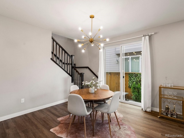 229 W Jamison Ct, Littleton, CO 80120 - dining space with stairs, a chandelier, and wood finished floors