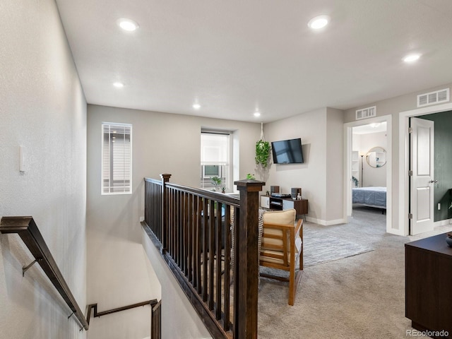 229 W Jamison Ct, Littleton, CO 80120 - stairway featuring carpet floors and recessed lighting