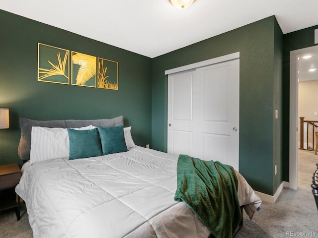 229 W Jamison Ct, Littleton, CO 80120 - carpeted bedroom with a closet and baseboards