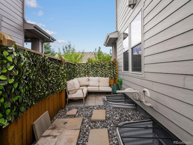 229 W Jamison Ct, Littleton, CO 80120 - fenced backyard featuring outdoor lounge area and a patio area