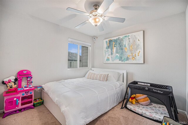 bedroom featuring carpet flooring and a ceiling fan