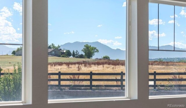 view of mountain feature featuring a rural view