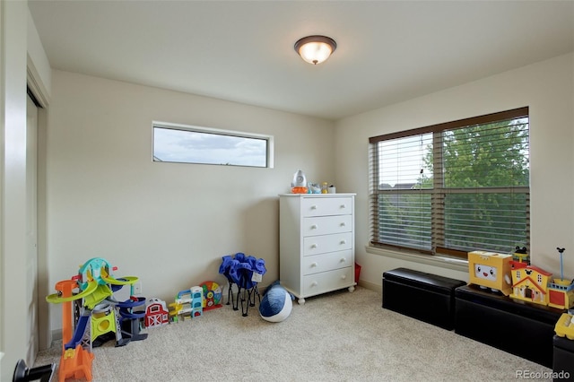 playroom with light colored carpet