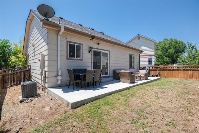 5033 Goshawk Ct, Brighton, CO 80601 - back of property featuring a fenced backyard, a patio area, and an outdoor hangout area