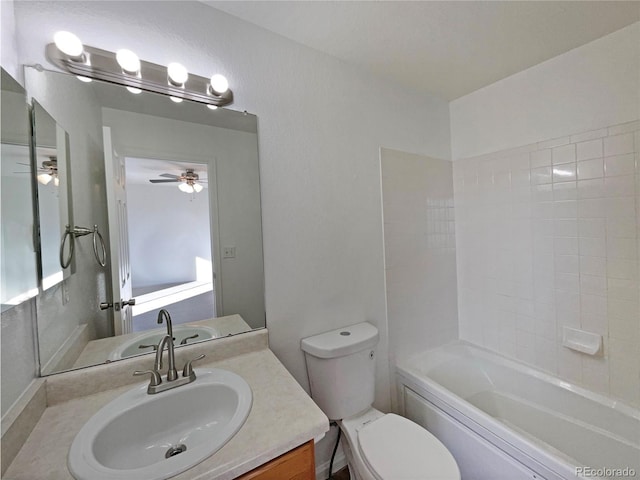 full bathroom featuring vanity, shower / washtub combination, ceiling fan, and toilet