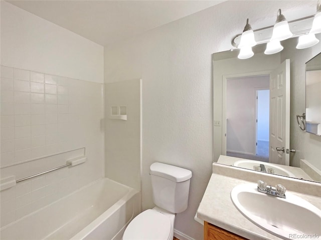 full bathroom featuring vanity, shower / bathing tub combination, and toilet