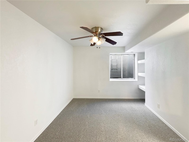 unfurnished room featuring carpet floors and ceiling fan