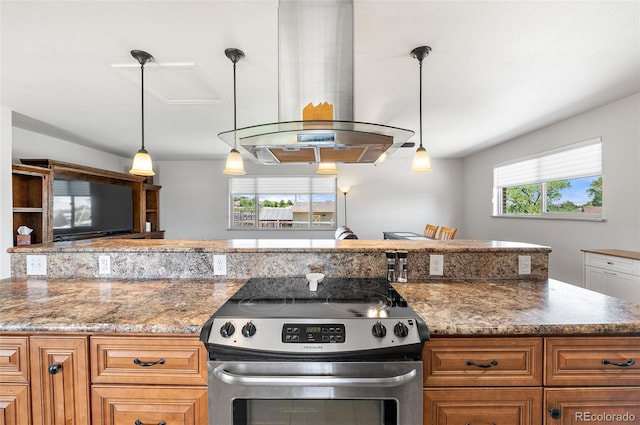 16225 W 74th Dr, Arvada, CO 80007 - kitchen featuring electric range, island range hood, brown cabinets, and pendant lighting