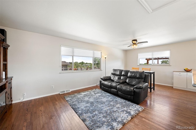 16225 W 74th Dr, Arvada, CO 80007 - living room with wood finished floors, ceiling fan, and baseboards
