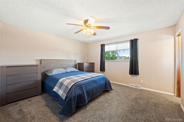16225 W 74th Dr, Arvada, CO 80007 - carpeted bedroom featuring a textured ceiling, baseboards, and ceiling fan