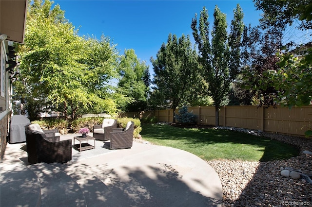 view of patio / terrace featuring a fenced backyard, outdoor lounge area, and area for grilling