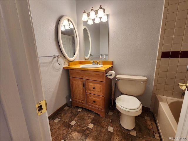 3354 S Flower St Unit 70, Lakewood, CO 80227 - bathroom featuring vanity and stone finish floors