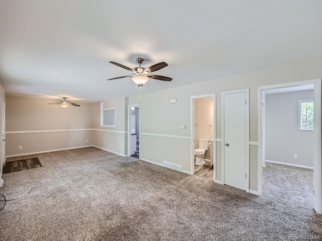 unfurnished room with carpet floors and ceiling fan