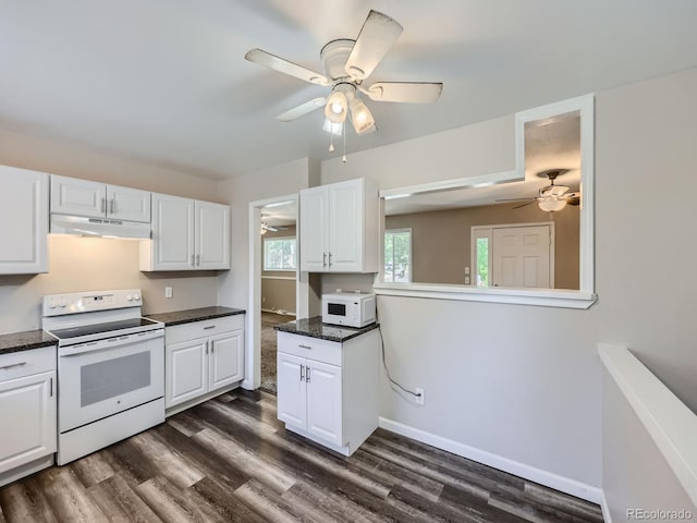 kitchen featuring white cabinetry, dark hardwood / wood-style floors, ceiling fan, and white appliances