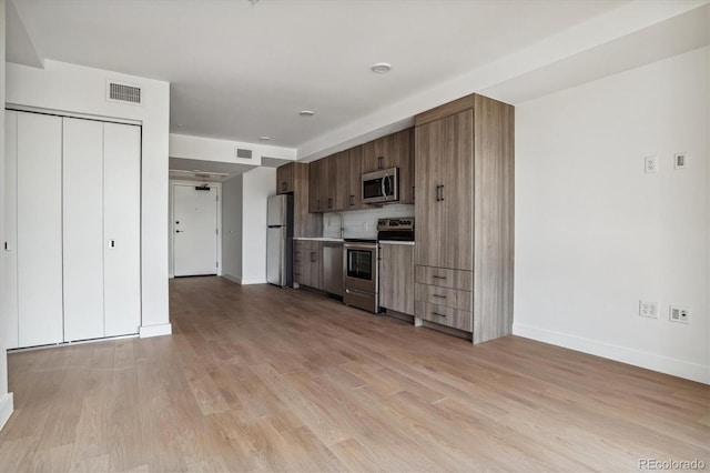 interior space with light hardwood / wood-style floors