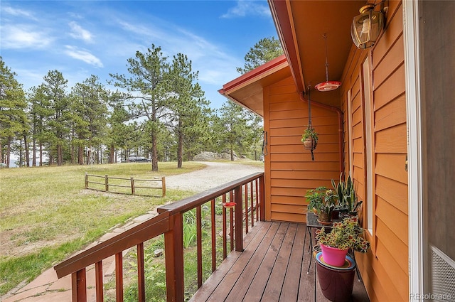 deck featuring a lawn