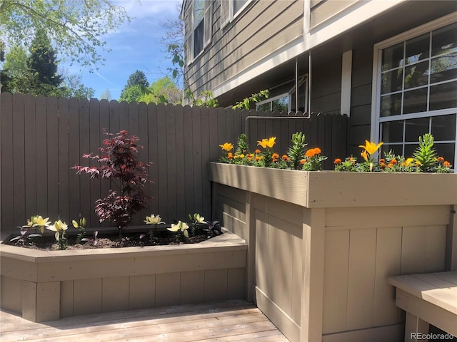 view of property exterior with fence