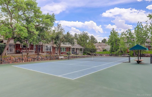 view of sport court featuring community basketball court and fence