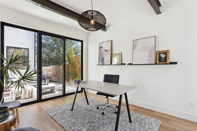 office with light wood-type flooring