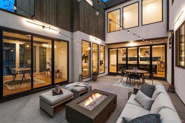 interior space featuring an outdoor living space with a fire pit