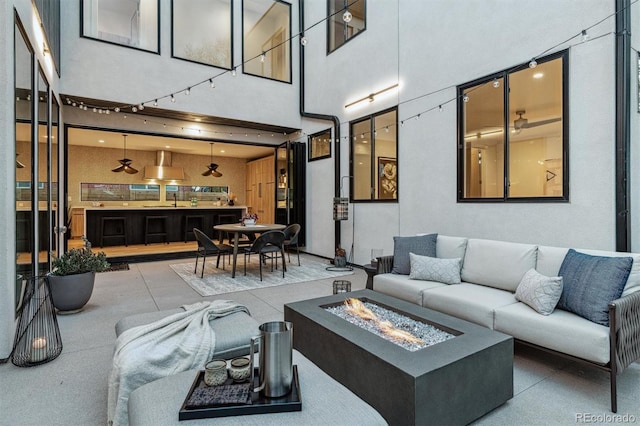 living room with a high ceiling