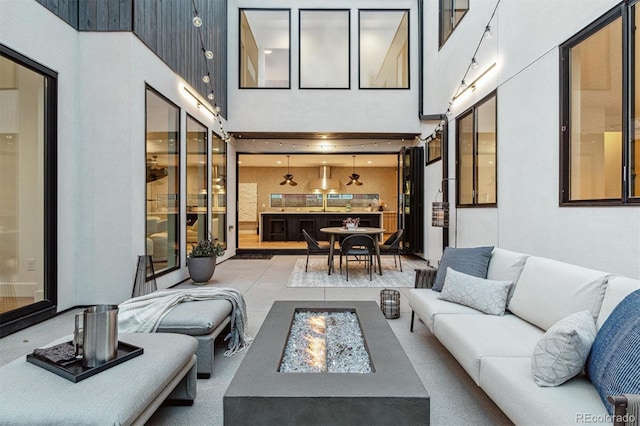 living room with a high ceiling