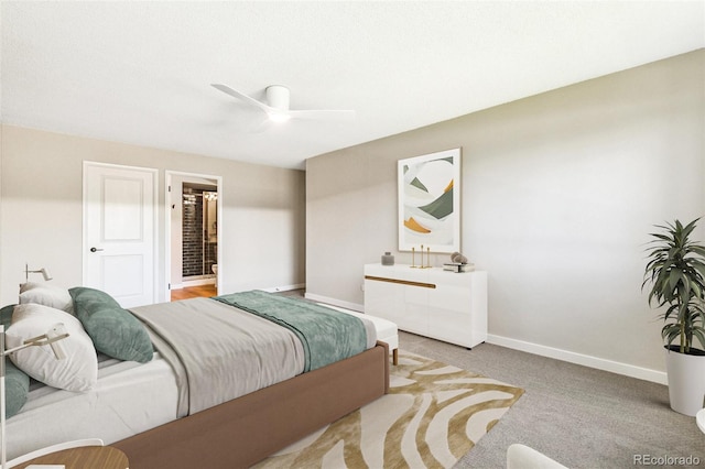 725 S Alton Way Unit 9C, Denver, CO 80247 - carpeted bedroom featuring baseboards and ceiling fan