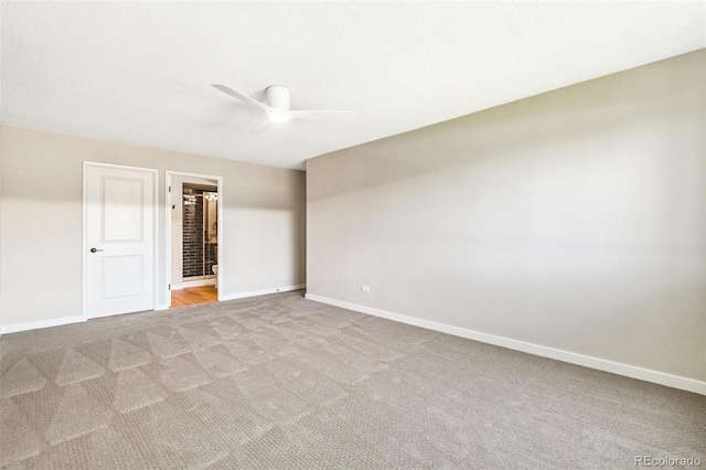 725 S Alton Way Unit 9C, Denver, CO 80247 - unfurnished bedroom with carpet flooring, ensuite bathroom, and ceiling fan