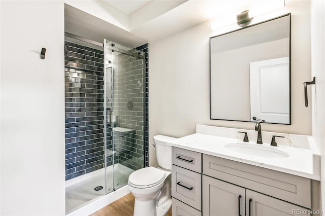 725 S Alton Way Unit 9C, Denver, CO 80247 - full bath with vanity, a stall shower, and wood finished floors