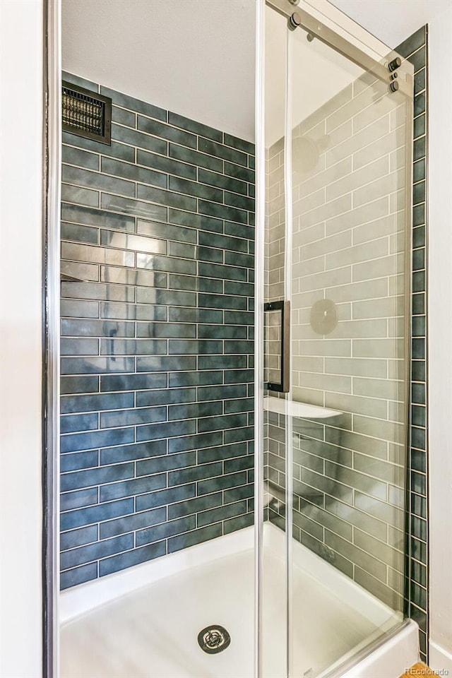 725 S Alton Way Unit 9C, Denver, CO 80247 - bathroom with a shower stall