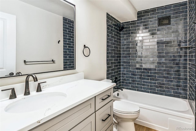 725 S Alton Way Unit 9C, Denver, CO 80247 - full bathroom with vanity, washtub / shower combination, and wood finished floors