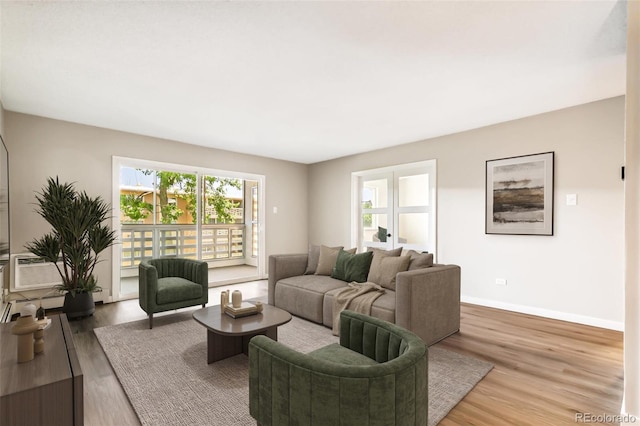 725 S Alton Way Unit 9C, Denver, CO 80247 - living area with wood finished floors