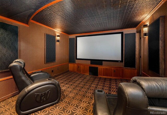 cinema room featuring crown molding