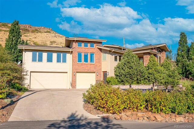 view of front of property with a garage