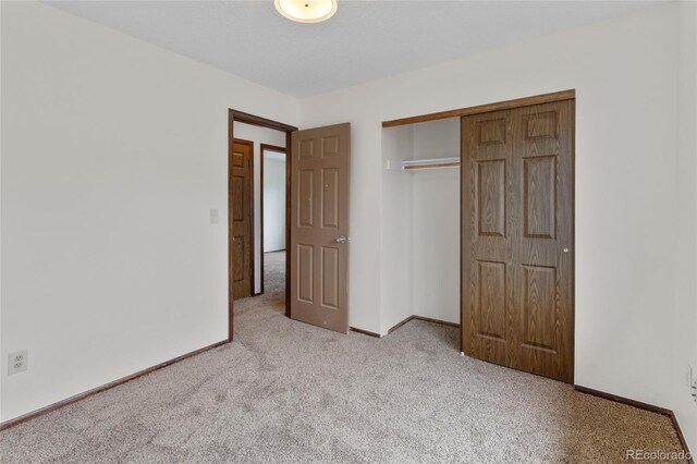 8441 S Timberwood St, Highlands Ranch, CO 80126 - unfurnished bedroom featuring carpet floors and a closet