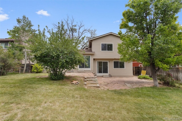 8441 S Timberwood St, Highlands Ranch, CO 80126 - rear view of property featuring a patio area