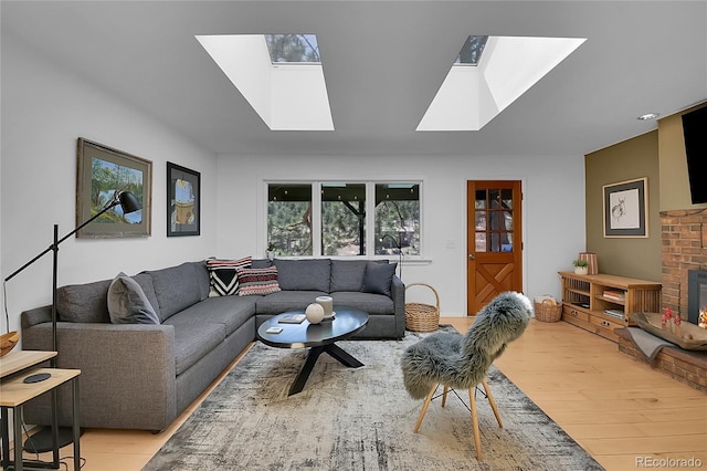 29858 Gigi Dr, Evergreen, CO 80439 - living area featuring light wood-type flooring and a skylight