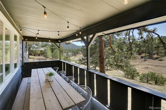 29858 Gigi Dr, Evergreen, CO 80439 - wooden terrace with a mountain view