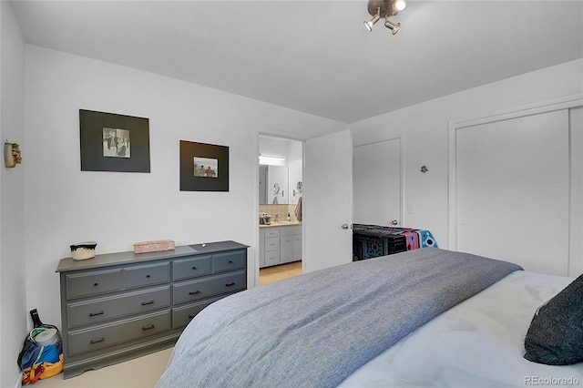 29858 Gigi Dr, Evergreen, CO 80439 - bedroom featuring ensuite bath and a sink