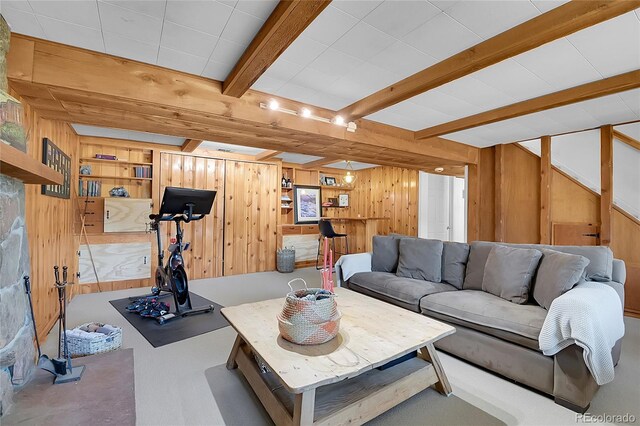 29858 Gigi Dr, Evergreen, CO 80439 - living room featuring wooden walls and beam ceiling