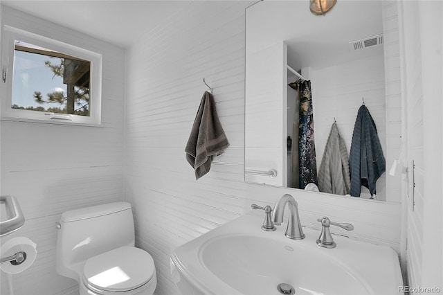 29858 Gigi Dr, Evergreen, CO 80439 - bathroom featuring a sink and tile walls