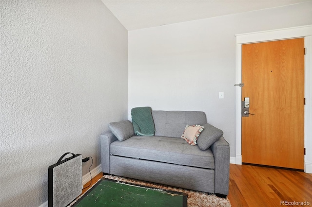 living area featuring hardwood / wood-style flooring