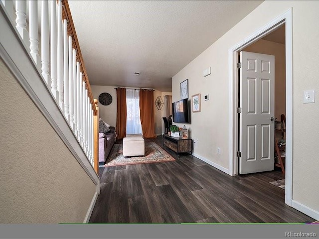 foyer entrance with dark wood-type flooring