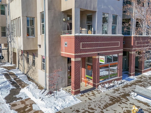 view of snow covered building