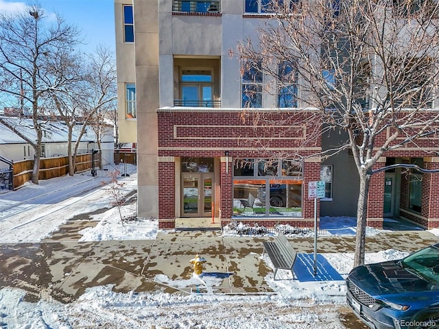 view of snow covered property