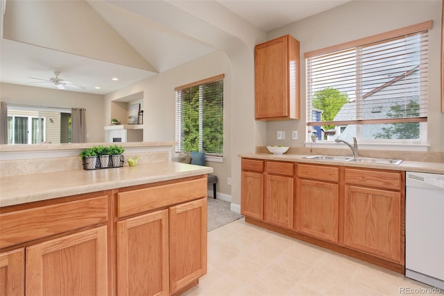 kitchen with dishwasher, lofted ceiling, sink, and ceiling fan