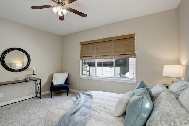 bedroom with ceiling fan and carpet